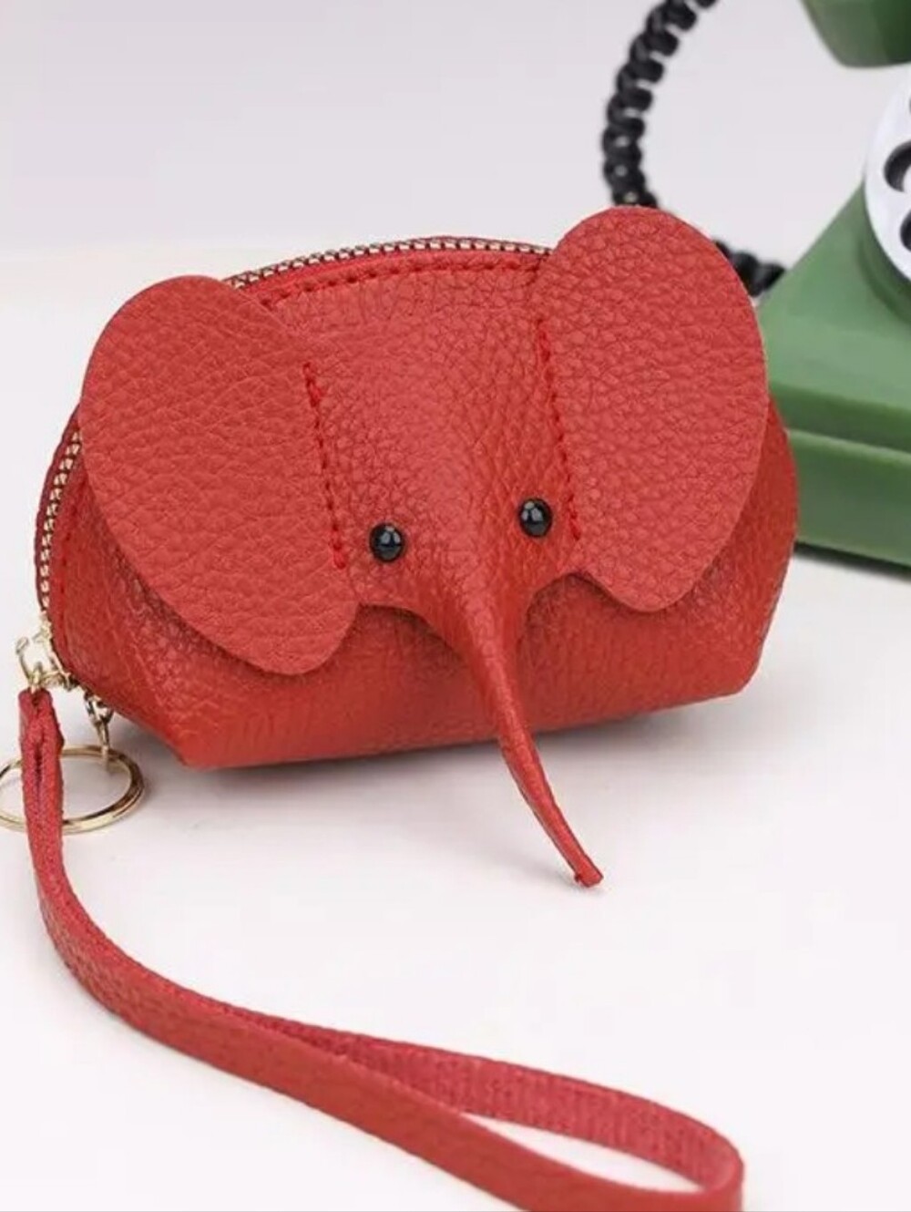 Rose Red Elephant wristlet/coin.purse is back in stock. Zipper closure -